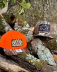 R880 Blaze Orange / Mossy Oak Bottomland Camo Twill w/ Camo Patch